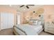 Cozy bedroom features stylish decor, a comfortable bed and soft lighting at 4200 E Brusca Way, Pahrump, NV 89061
