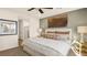 Inviting bedroom features a large window, a comfortable bed, side tables, and soft lighting at 4200 E Brusca Way, Pahrump, NV 89061