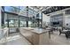 Community kitchen featuring an island, pendant lighting, stainless appliances, and golf course views at 4200 E Brusca Way, Pahrump, NV 89061