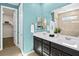 Modern bathroom with double vanity, sleek countertops, and a walk in closet at 4250 E Brusca Way, Pahrump, NV 89061