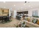 Open-concept living space combining living, dining, and kitchen areas for seamless entertaining at 4250 E Brusca Way, Pahrump, NV 89061