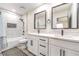 Bathroom with double sink vanity and tiled shower and tub combo at 4437 Alto Verde Dr, Las Vegas, NV 89119