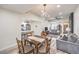 Spacious dining area adjacent to the living room and kitchen, offering an open layout at 4437 Alto Verde Dr, Las Vegas, NV 89119
