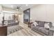 Spacious living room with two sofas, a modern fireplace, and stylish decor at 4437 Alto Verde Dr, Las Vegas, NV 89119