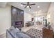 Bright living room featuring a modern fireplace, recessed lighting, and an open floorplan at 4437 Alto Verde Dr, Las Vegas, NV 89119