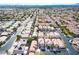 Expansive neighborhood featuring many residences, manicured landscaping and mature trees for shady curb appeal at 4507 Grotto Ct, North Las Vegas, NV 89031