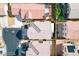 Birds-eye view of this house with a well-maintained roof surrounded by other residences in this neighborhood at 4507 Grotto Ct, North Las Vegas, NV 89031