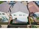 Aerial view displays a well-maintained backyard featuring a covered patio and landscaped area at 4507 Grotto Ct, North Las Vegas, NV 89031