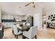 Bright dining area featuring a table with chairs, stainless appliances, and modern finishes at 4507 Grotto Ct, North Las Vegas, NV 89031