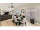 Bright dining area showcases a table with chairs and seamless living room integration at 4507 Grotto Ct, North Las Vegas, NV 89031