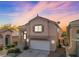 Charming two-story home with a well-maintained front yard and attached garage in a quiet neighborhood at 4507 Grotto Ct, North Las Vegas, NV 89031