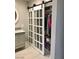 Elegant bathroom vanity with white countertops and sliding barn door closet at 502 E Fairway Rd, Henderson, NV 89015