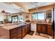 Well-appointed kitchen featuring granite countertops, stainless steel appliances, and custom cabinetry at 502 E Fairway Rd, Henderson, NV 89015