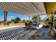 Covered patio perfect for al fresco dining, complete with tiled floors at 502 E Fairway Rd, Henderson, NV 89015