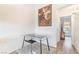 Bright dining area featuring a modern glass table and a view to the hallway at 515 Kristin Ln, Henderson, NV 89011