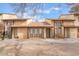 Inviting townhome exterior with well-maintained landscaping and neutral color palette at 515 Kristin Ln, Henderson, NV 89011