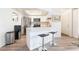 Updated kitchen with breakfast bar, stainless steel appliances, and ample counter space at 515 Kristin Ln, Henderson, NV 89011