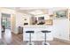 Modern kitchen with stainless steel appliances and bar seating for casual dining at 515 Kristin Ln, Henderson, NV 89011