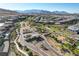 Beautiful aerial view of a Primary-planned community with elegant landscaping and desert surroundings at 5155 Rock Daisy Dr, Las Vegas, NV 89135