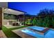 Outdoor kitchen and dining area with a pool and spa, perfect for outdoor living and entertaining at 5155 Rock Daisy Dr, Las Vegas, NV 89135