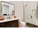 Elegant bathroom featuring a modern vanity, sleek fixtures, and a glass-enclosed shower at 5155 Rock Daisy Dr, Las Vegas, NV 89135