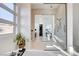 Bright bathroom featuring a modern tub and walk-in glass shower at 5155 Rock Daisy Dr, Las Vegas, NV 89135