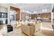 Bright, open-concept living room with hardwood floors, recessed lights and a modern design, perfect for entertaining at 5155 Rock Daisy Dr, Las Vegas, NV 89135