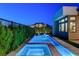 Beautiful pool and spa area surrounded by lush greenery offering a private and serene outdoor space at 5155 Rock Daisy Dr, Las Vegas, NV 89135