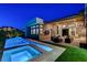 Stunning pool and spa with an outdoor seating area and fire pit, perfect for entertaining on warm evenings at 5155 Rock Daisy Dr, Las Vegas, NV 89135
