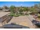 Entertainer's backyard featuring pavers, built-in grill, and lush landscaping, including a fountain at 5854 Sheila Ave, Las Vegas, NV 89108