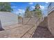 Fully fenced backyard with a brick-paved area, offering privacy and ample space at 5854 Sheila Ave, Las Vegas, NV 89108