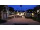 Expansive backyard featuring an outdoor kitchen, bar, lighting and desert landscaping, perfect for relaxing and entertaining at 5854 Sheila Ave, Las Vegas, NV 89108
