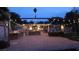 Backyard with a fountain, pavers, an outdoor kitchen, pergola, and string lighting at 5854 Sheila Ave, Las Vegas, NV 89108