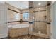 Bathroom showcasing a walk-in shower, and soaking tub at 5854 Sheila Ave, Las Vegas, NV 89108