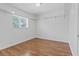 Bedroom with hardwood floors, and built-in shelves for maximum storage at 5854 Sheila Ave, Las Vegas, NV 89108