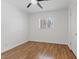 Bright bedroom with hardwood floors, ceiling fan, and window for natural light at 5854 Sheila Ave, Las Vegas, NV 89108