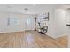 Light, bright entryway with hardwood floors, modern light fixtures, and an eye-catching console table at 5854 Sheila Ave, Las Vegas, NV 89108