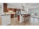Modern kitchen featuring stainless steel appliances, granite countertops, and a breakfast bar at 5854 Sheila Ave, Las Vegas, NV 89108