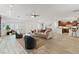 Bright and airy living area with an open layout, wood-look tile, and recessed lights at 5854 Sheila Ave, Las Vegas, NV 89108