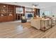 Living room with a stone fireplace, built-in cabinets, and ample natural light at 5854 Sheila Ave, Las Vegas, NV 89108