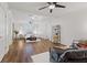 Spacious main bedroom boasts hardwood floors, ceiling fan, and a seating area at 5854 Sheila Ave, Las Vegas, NV 89108