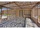 Charming covered patio with decorative wrought iron and patterned tile flooring at 5854 Sheila Ave, Las Vegas, NV 89108