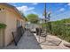 Spacious side yard features partial fencing and secure storage for outdoor equipment at 5854 Sheila Ave, Las Vegas, NV 89108