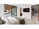 Elegant bedroom featuring a walk out to the pool and an en suite bathroom and walk in closet at 6 Rock Mount Ct, Henderson, NV 89012