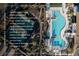 Aerial view of the community pool, private cabanas, tennis pavilion, and Gathering park with community trails at 6 Rock Mount Ct, Henderson, NV 89012