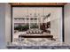 Open-concept kitchen with marble countertops and eat-in island seating at 6 Rock Mount Ct, Henderson, NV 89012