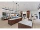 Bright, open kitchen featuring modern appliances, marble countertops, an oversized island and barstool seating at 6 Rock Mount Ct, Henderson, NV 89012