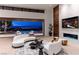 Modern living room with large sliding doors that lead to the pool, offering scenic views at 6 Rock Mount Ct, Henderson, NV 89012
