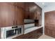 Spacious pantry with floor-to-ceiling cabinets, marble countertop, modern appliances, and ample storage at 6 Rock Mount Ct, Henderson, NV 89012
