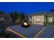 Beautiful patio with fireplace that opens up to a cozy modern bedroom with a canopy bed at 6 Rock Mount Ct, Henderson, NV 89012